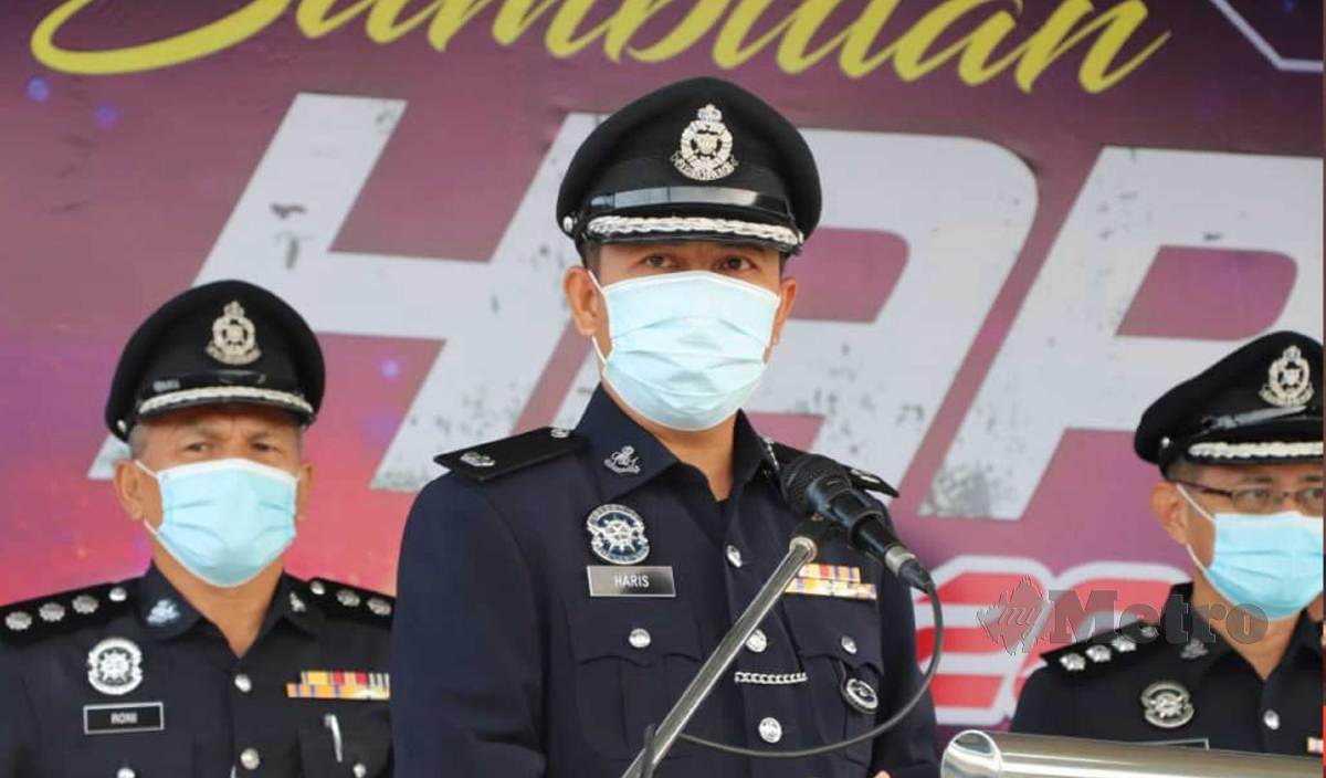 MOHD Haris ketika berucap sempena Sambutan Hari Polis ke 214 Peringkat IPD Penampang. FOTO Yun Mikail