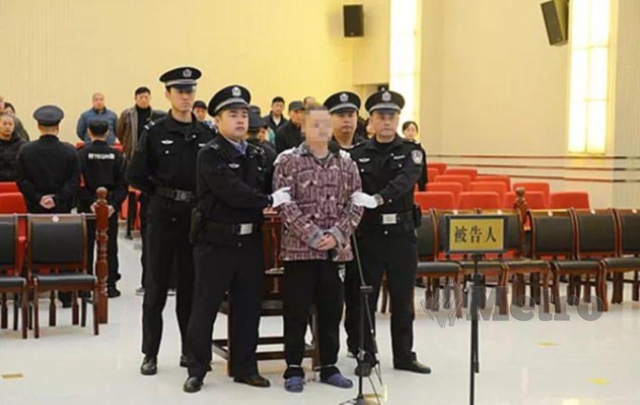 WANG (tengah) dijatuhi hukuman mati selepas menikam Liu di dalam kelas. FOTO AGENSI