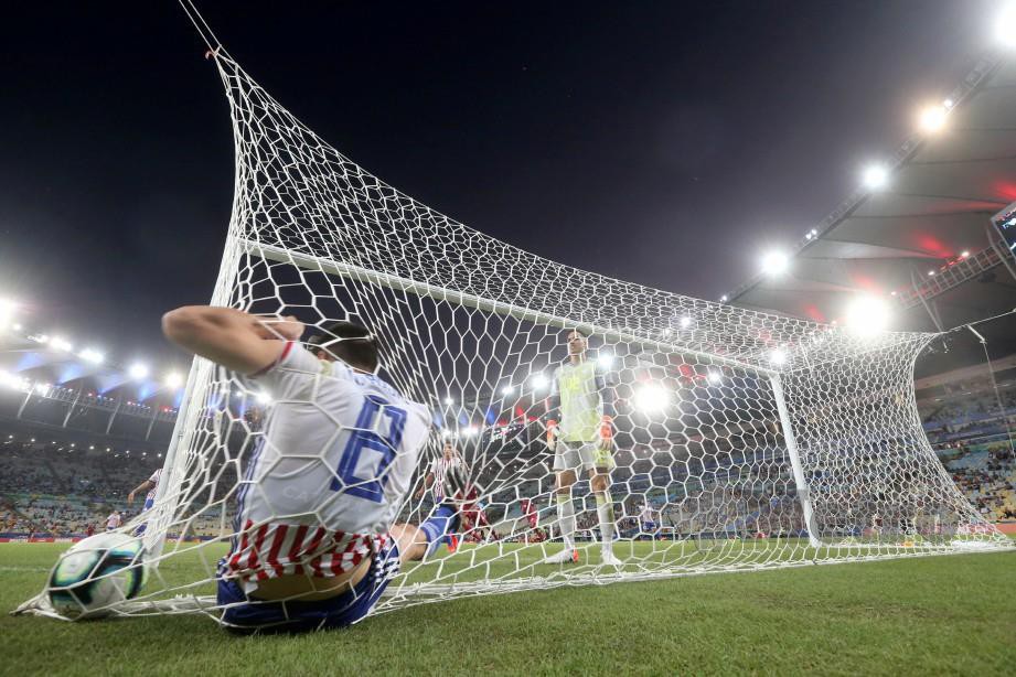 Aksi Paraguay menentang Qatar pada aksi Copa America di Stadium Maracana, Rio de Janeiro, Brazil berakhir dengan keputusan seri 2-2. FOTO Reuters