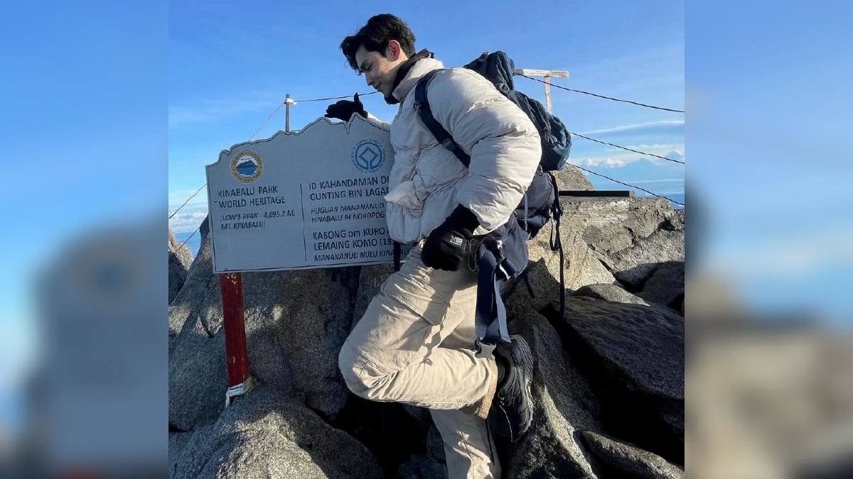 NIK Izzuddin Omary ketika mendaki Gunung Kinabalu. FOTO Ihsan Pembaca.
