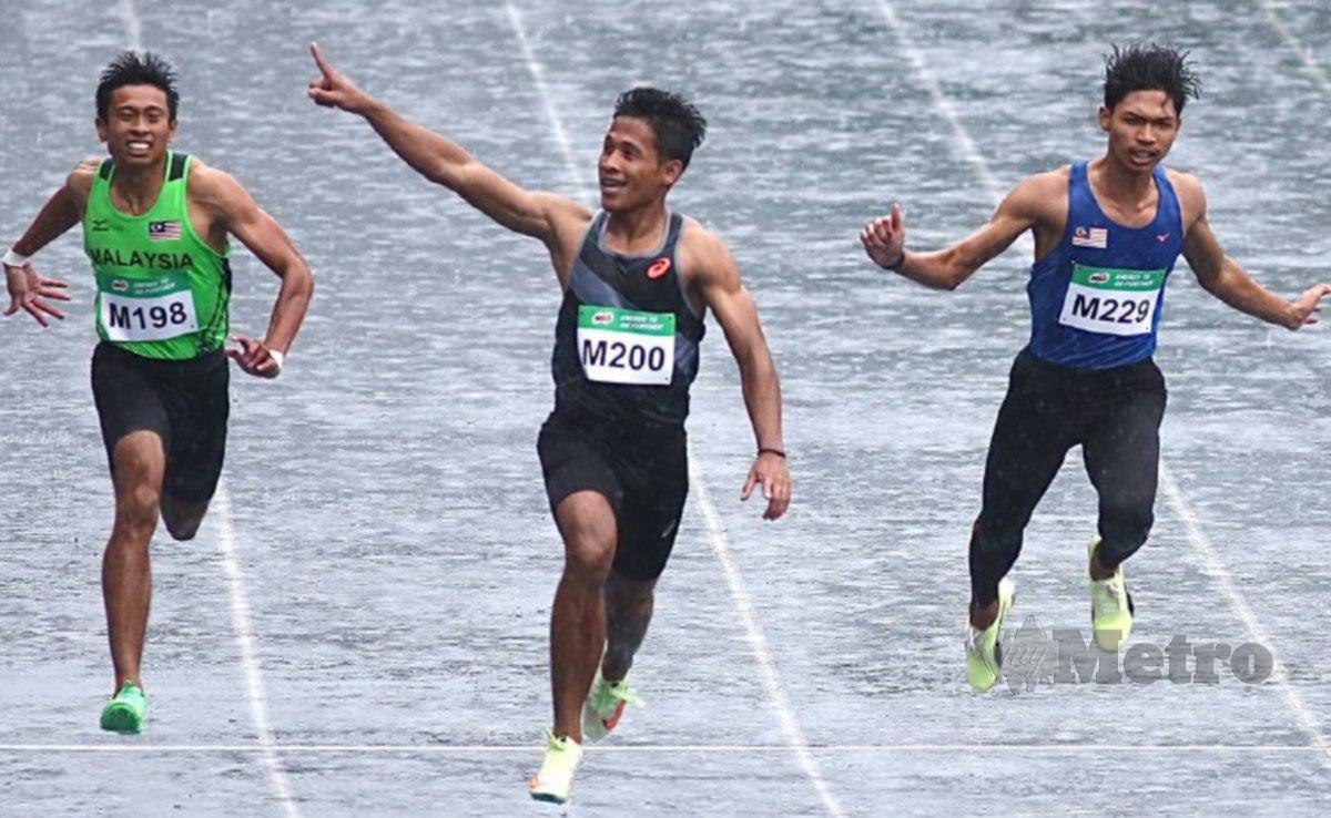 HAIQAL (tengah) memenangi acara 100m pada kejohanan Olahraga Terbuka Malaysia, hari ini. FOTO Fathil Asri