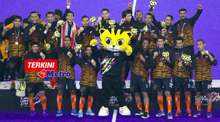Pemain Malaysia meraikan kejayaan raih emas. FOTO MOHAMAD SHAHRIL BADRI SAALI