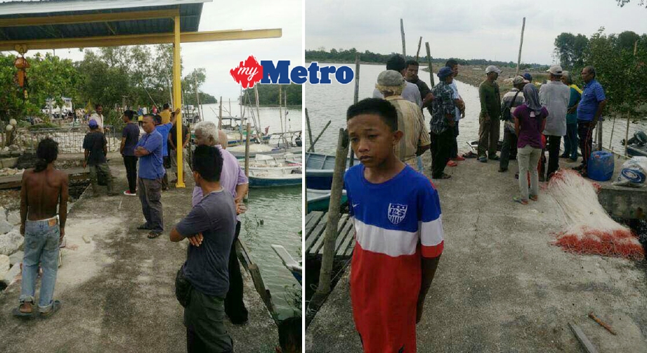 Rakan dan ahli keluarga dua nelayan yang hilang berkumpul di jeti Pangkalan Nelayan Kesang. - Foto Ihsan Pembaca
