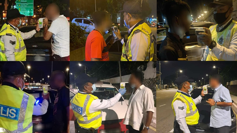 ANGGOTA polis memeriksa kandungan alkohol pemandu kenderaan dalam Op Alkohol dan Pencegahan Jenayah oleh Ibu Pejabat Polis Daerah (IPD) Petaling Jaya. FOTO ihsan POLIS