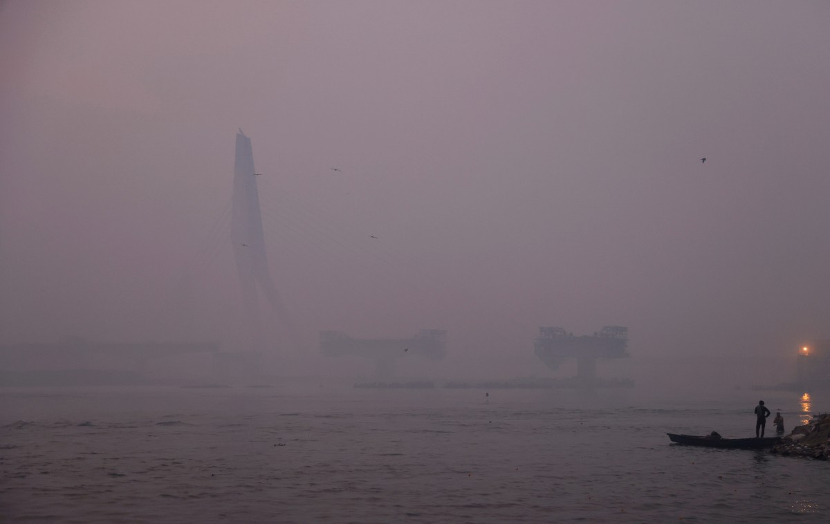Keadaan pada waktu pagi di New Delhi. - FOTO Reuters