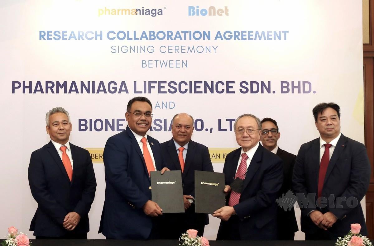 MAJLIS menandatangani memorandum persefahaman antara Pharmaniaga dan Bionet. - Gambar NSTP/AMIRUDIN SAHIB