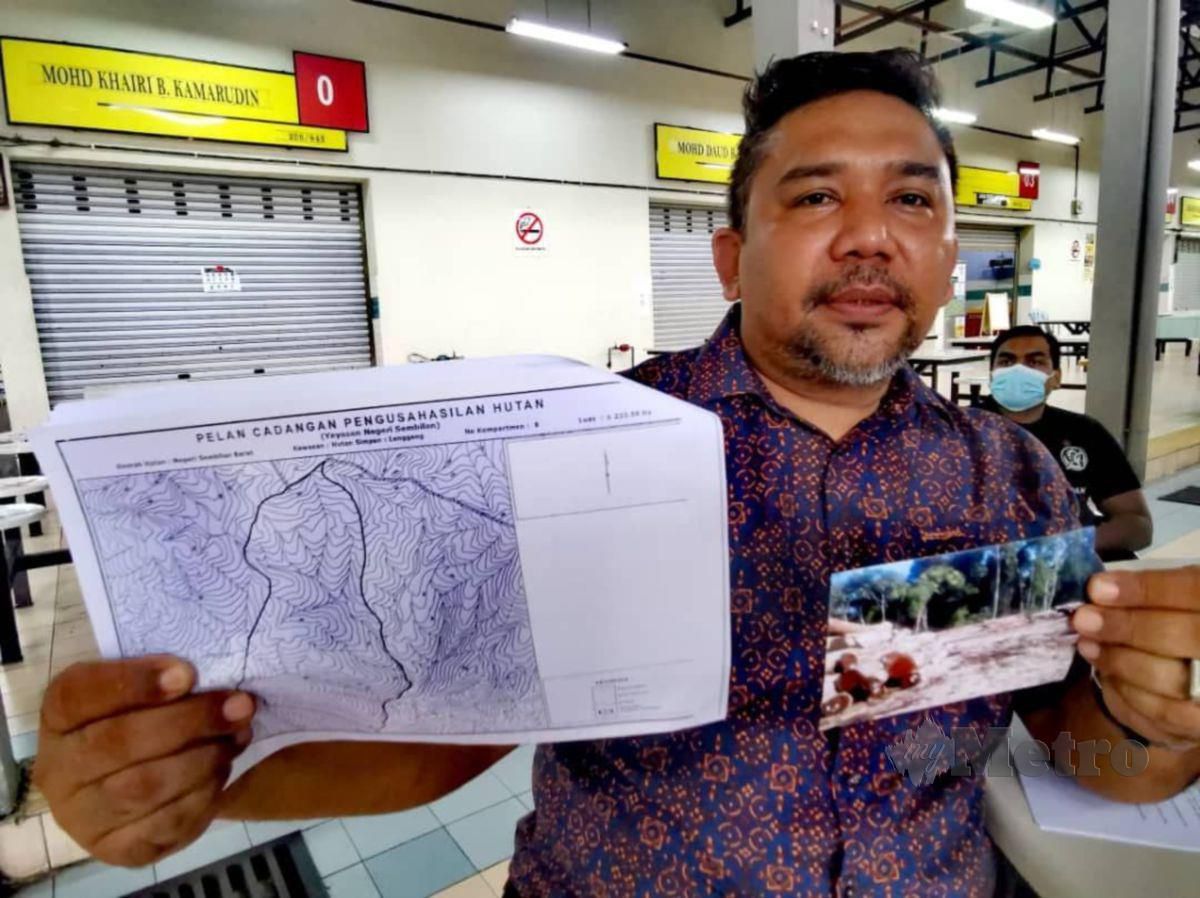 ZOOL Amali menunjukkan peta lokasi aktiviti pembalakan yang didakwa berlaku di Lenggeng. FOTO Mohd Amin Jalil