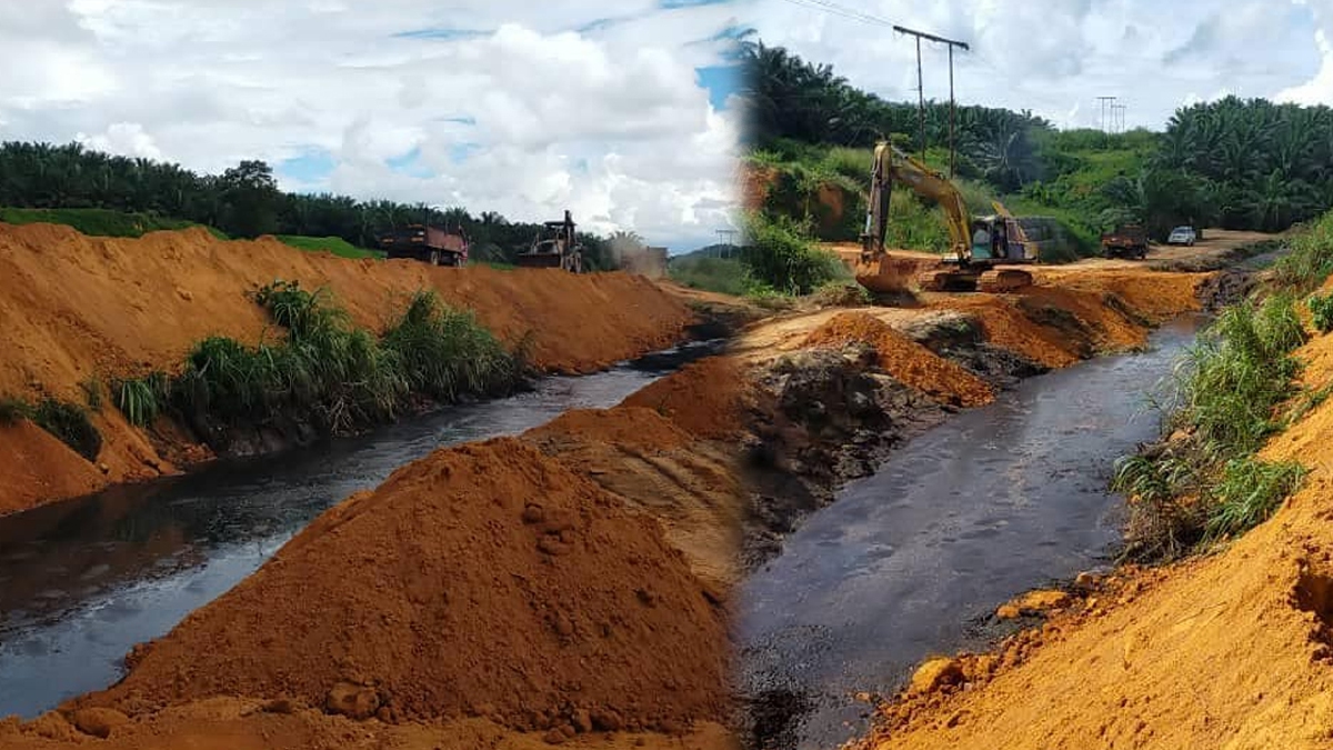 JAS sedang memantau kerja pembaikan benteng kolam pengolahan efluen yang pecah Selasa lalu sehingga menyebabkan pencemaran sungai di Ulu Keratong, Rompin, Pahang. FOTO ihsan FB