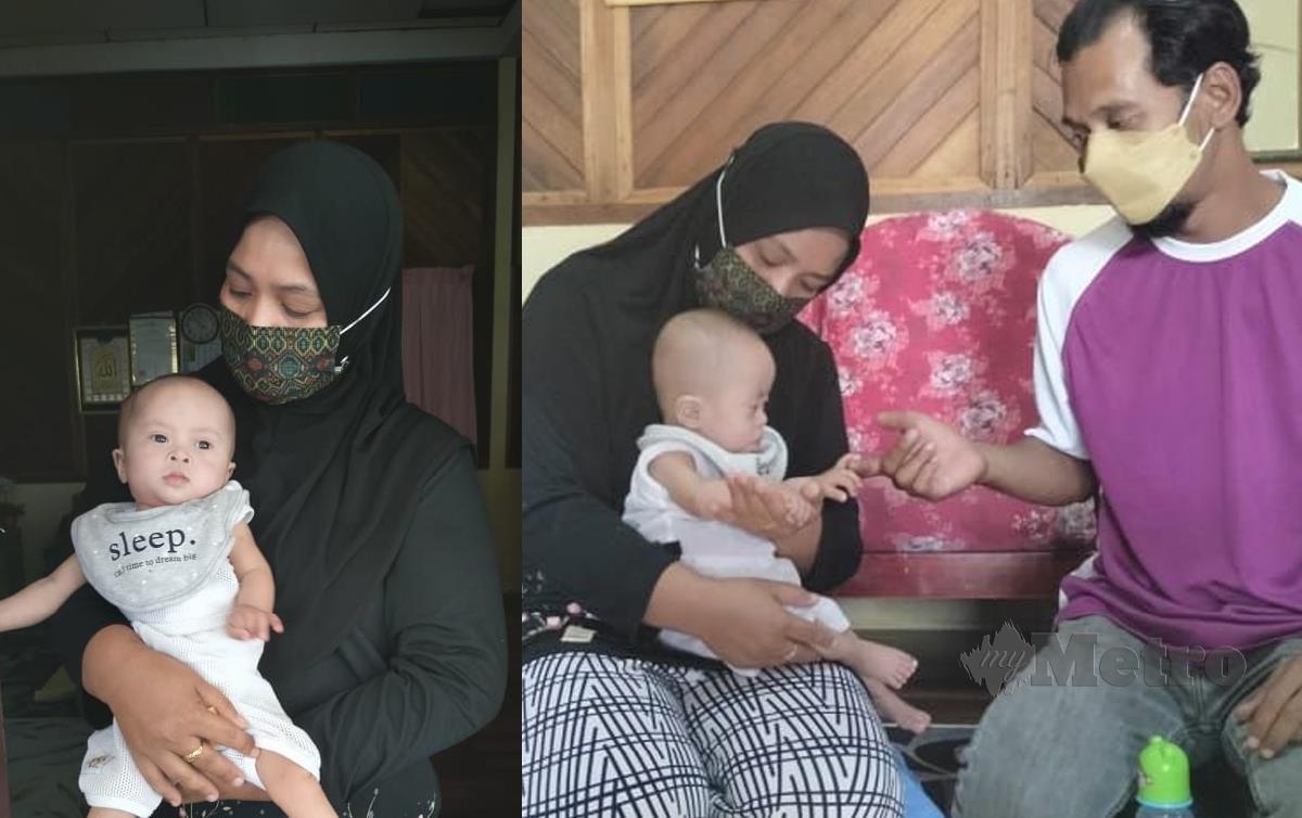 Pencari barangan lusuh, Sah Rizal Mohamed Aripin dan isteri, Norizan Mohd Jais bersama bayi mereka. FOTO Amirul Aiman Hamsuddin