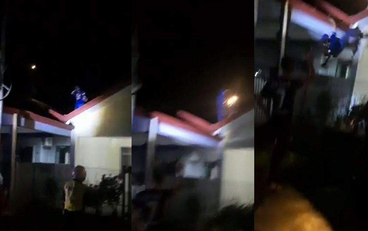 TANGKAP layar video tular suspek memanjat bumbung rumah elak ditahan. FOTO ihsan Pembaca
