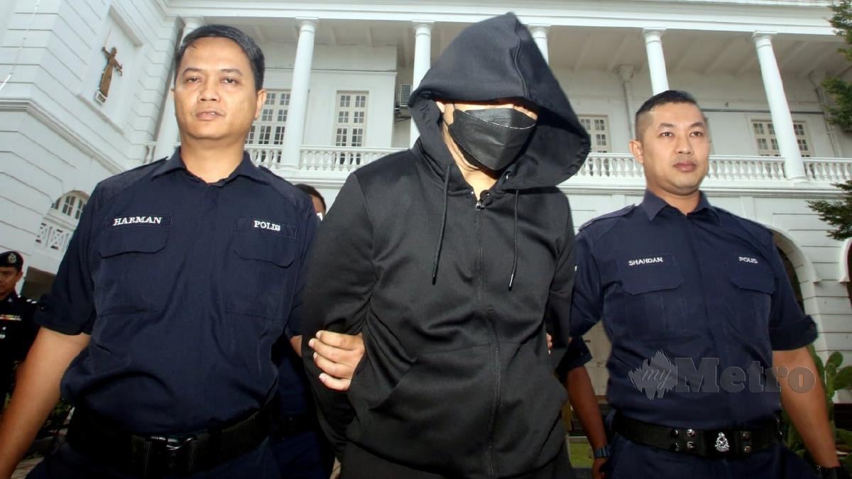 Mohd Nazri Abdul Razak dibawa ke Mahkamah Tinggi Ipoh hari ini. FOTO L. MANIMARAN