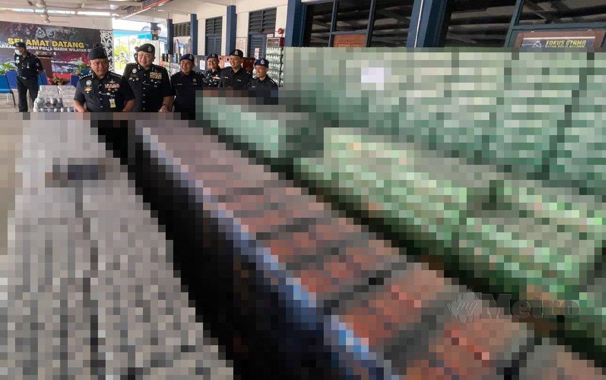 DATUK Kamarul menunjukkan antara rampasan arak yang berjumlah RM 1.1 juta.  FOTO Nur Aisyah Mazalan