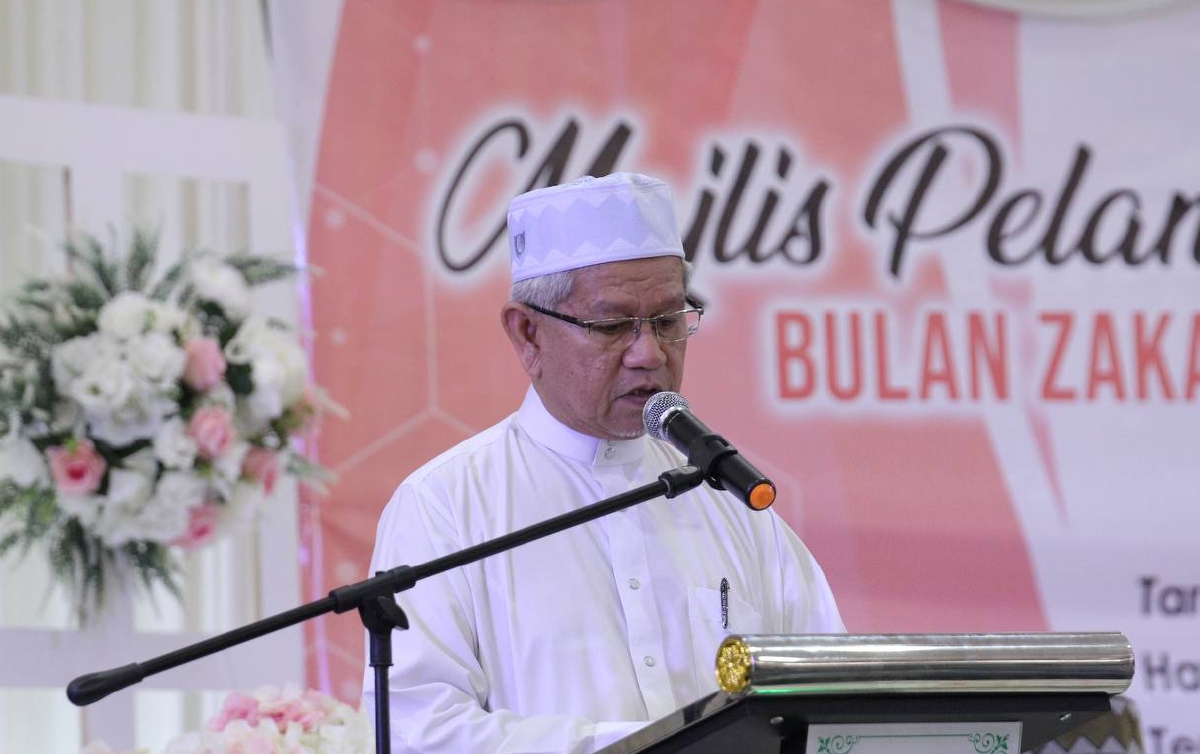 DATUK Ir Ahmad Zakiyuddin Abdul Rahman berucap ketika majlis pelancaran Bulan Zakat Negeri Pulau Pinang di Masjid Daerah Seberang Perai Utara. FOTO ihsan ZPP
