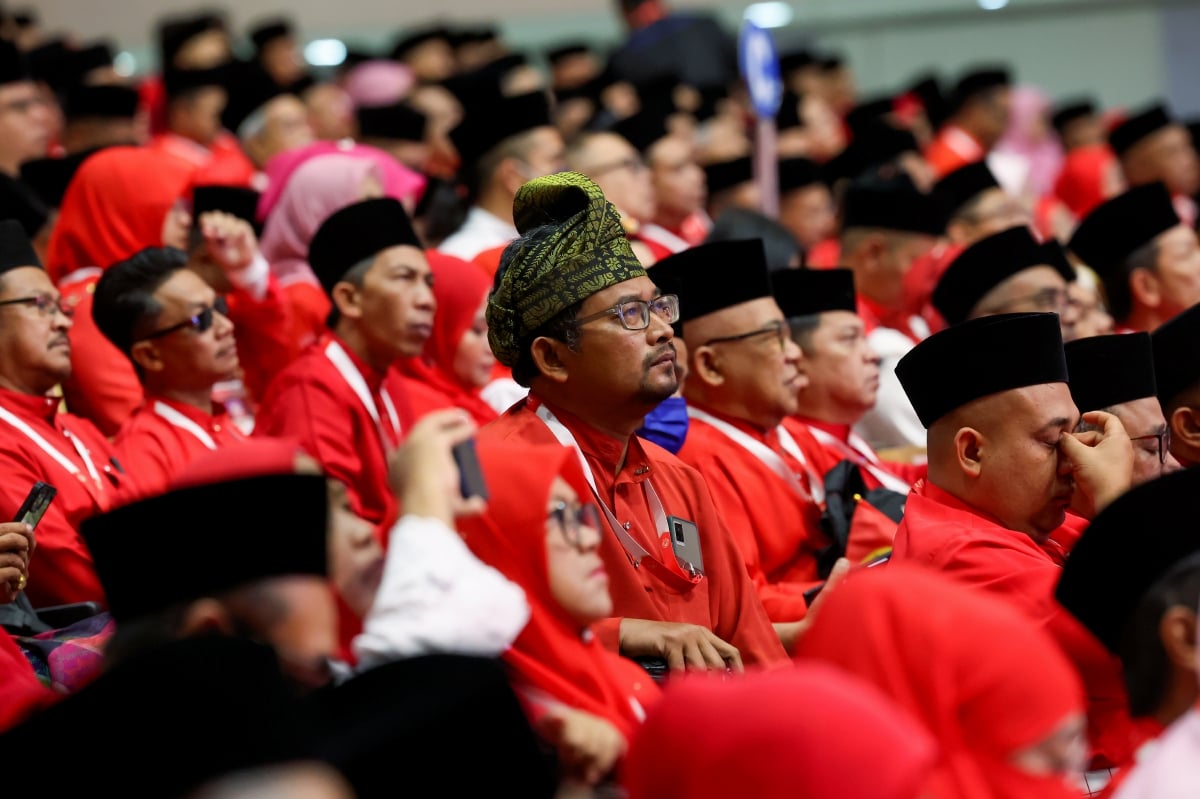 PERWAKILAN ketika mendengar ucapan dasar Presiden UMNO Datuk Seri Dr Ahmad Zahid Hamidi. FOTO Bernama