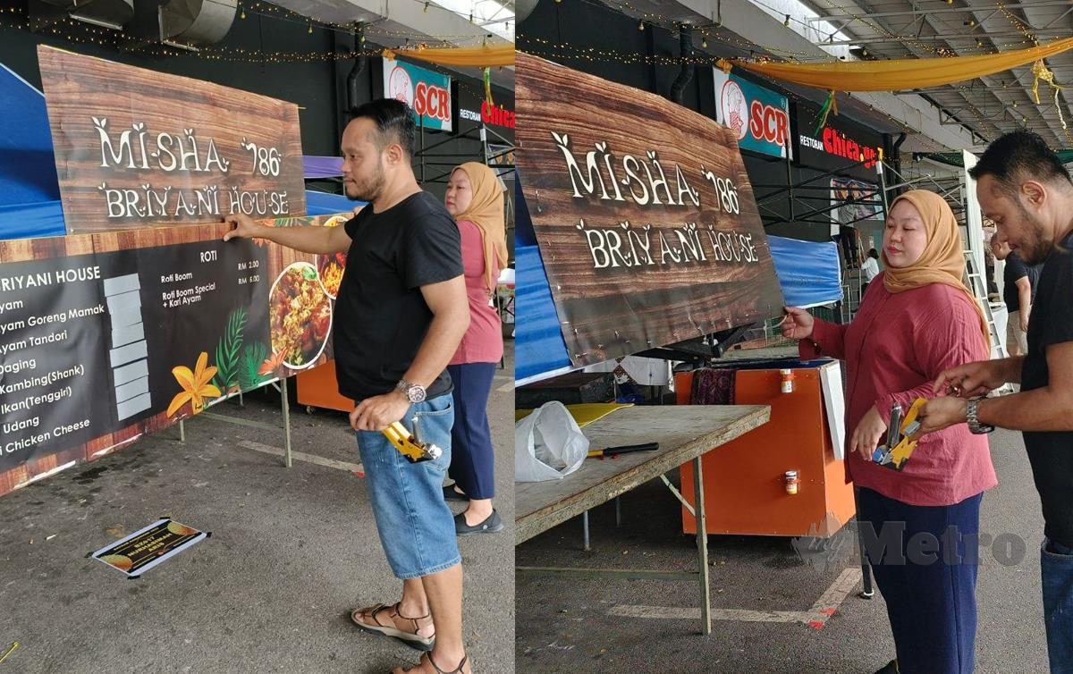 TONY Osman menyiapkan gerainya di Bazar Ramadan eMart Batu Kawa. FOTO Mohd Roji Kawi
