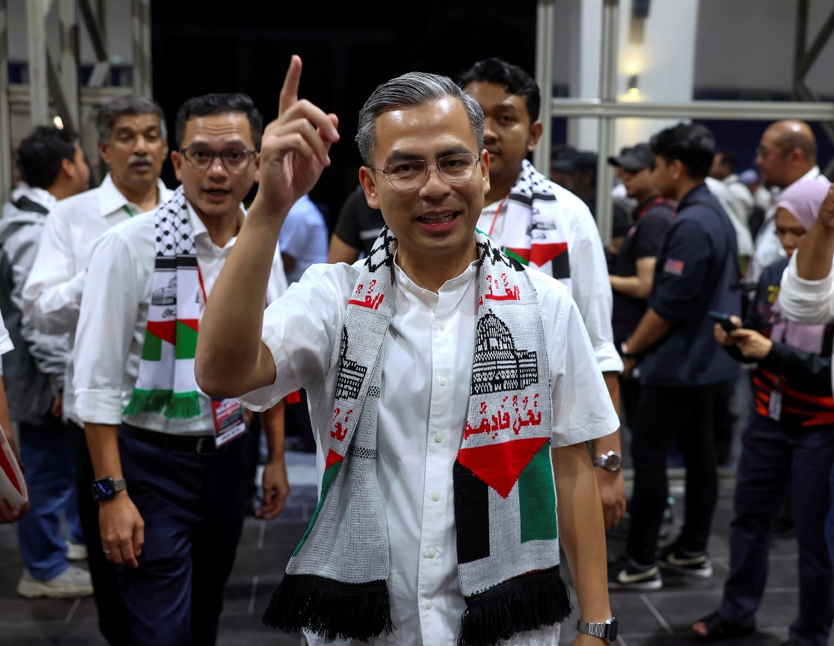 Menteri Komunikasi dan Digital Fahmi Fadzil menghadiri Himpunan Malaysia Bersama Palestin di Stadium Axiata Arena Bukit Jalil malam ini. FOTO BERNAMA