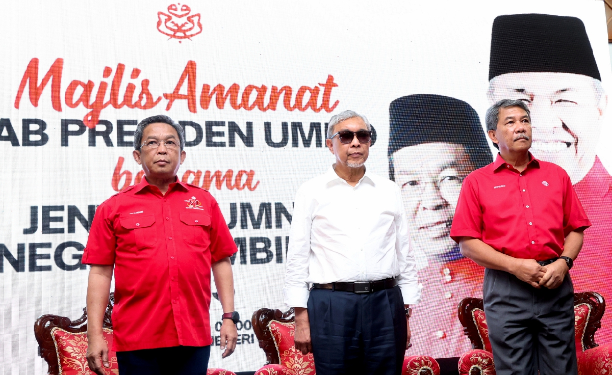 AHMAD Zahid bersama Mohamad dan Jalaluddin ketika menghadiri Majlis Amanat Presiden bersama jentera UMNO Negeri Sembilan. FOTO BERNAMA