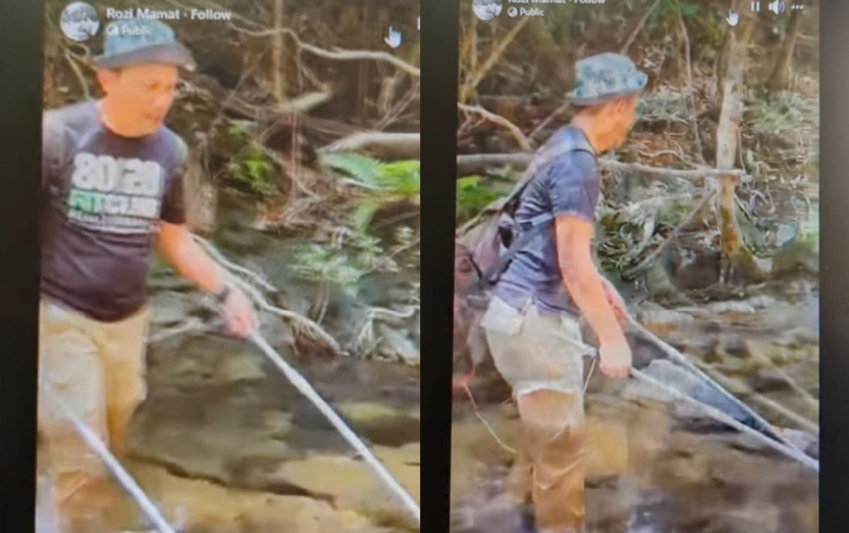 TANGKAP layar video tular memapar Datuk Rozi bersama beberapa lagi individu menangkap ikan menggunakan kaedah renjatan elektrik di sebuah alor sungai. FOTO ihsan Pembaca