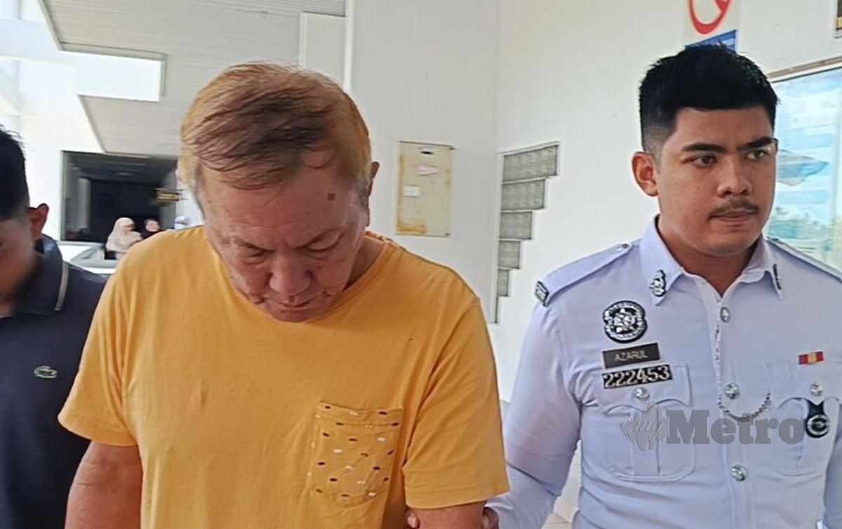 Toong Chen Qen (baju t kuning) dihukum penjara sehai dan dikenakan denda RM10,000. FOTO Meor Riduwan Meor Ahmad