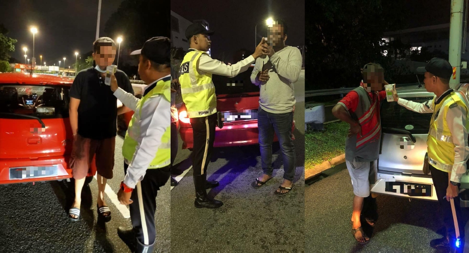 ANGGOTA polis melakukan ujian alkohol terhadap pemandu dalam Operasi Alkohol dan Pencegahan Jenayah yang dilakukan di beberapa lokasi di Petaling Jaya, semalam. FOTO ihsan PDRM