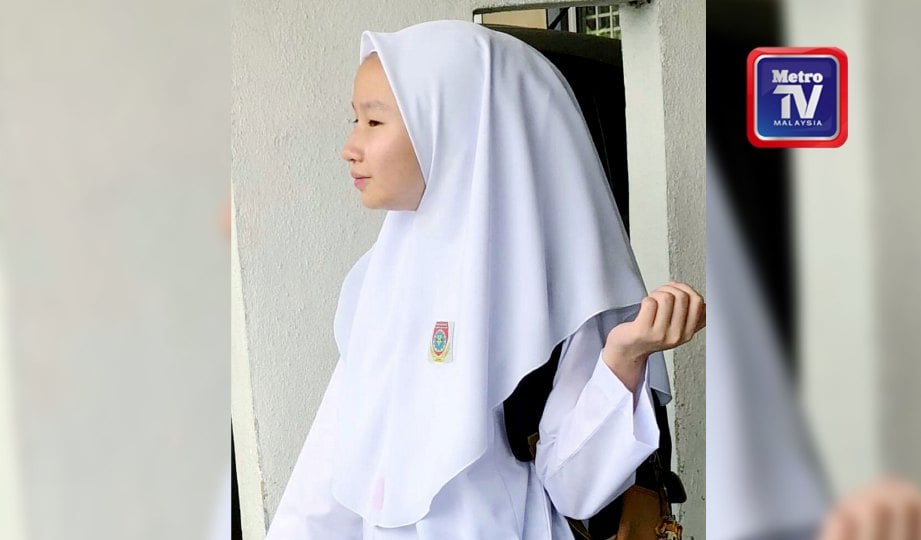 NUR Iman Safiyah menggayakan tudung sekolah jenama sendiri TSIS.