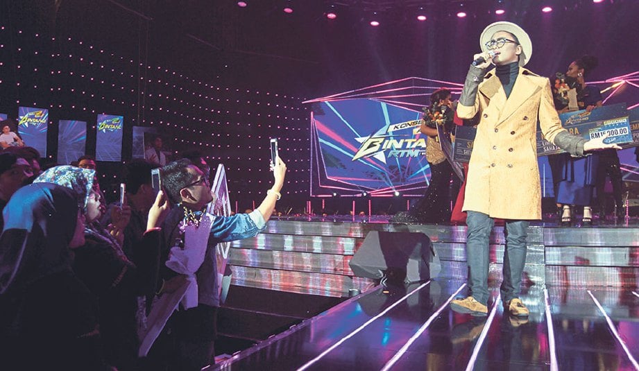 PENGHAYATAN tersendiri Hariz menerusi lagu Yang Terbaik membantu kemenangannya sebagai juara Bintang RTM 2018.