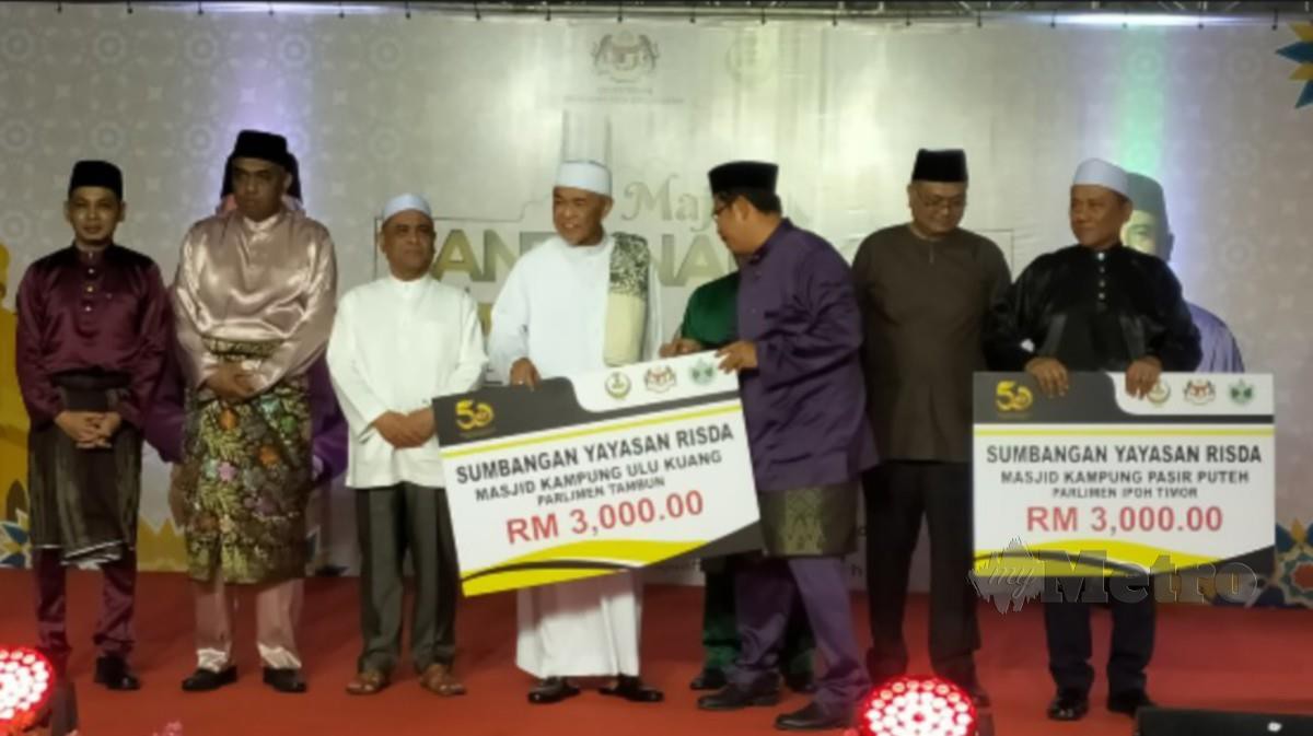 AHMAD Zahid ketika menghadiri Majlis Santunan Kasih Ramadan Negeri Perak. FOTO Muhammad Zulsyamini Suffian Suri.
