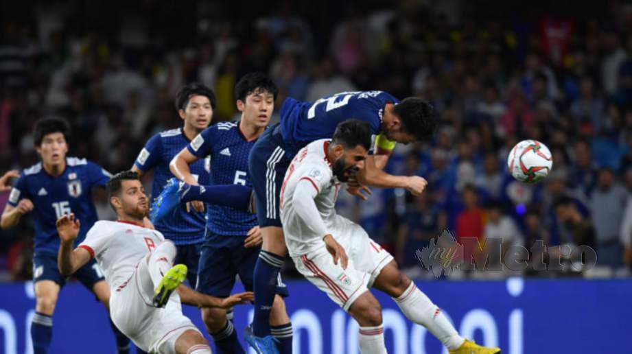 IRAN (jersi putih) tewas kepada Jepun pada separuh akhir Piala Asia di UAE. — FOTO Agensi