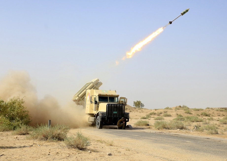 Pelancar roket pasukan militan syiah dikenali sebagai Briged Imam Ali akan terus memerangi Daish. FOTO Agensi/Khider Abbas 