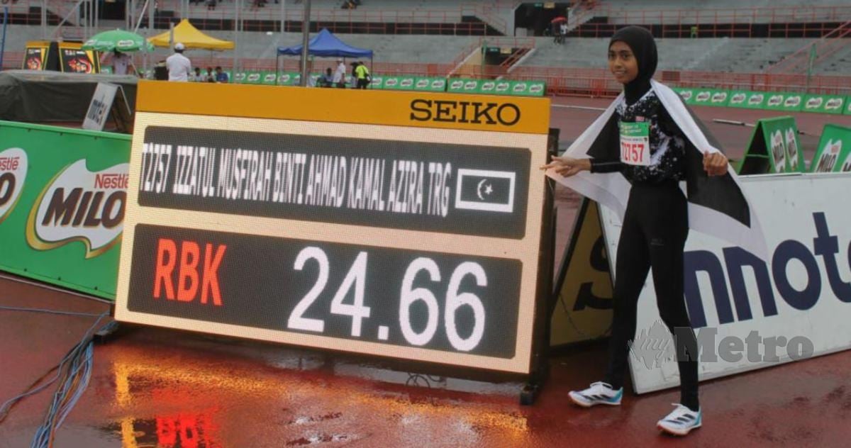 IZZATUL  mencipta rekod baharu acara 200m sekali gus mengumpul empat pingat emas. FOTO Mohd Amin Jalil.