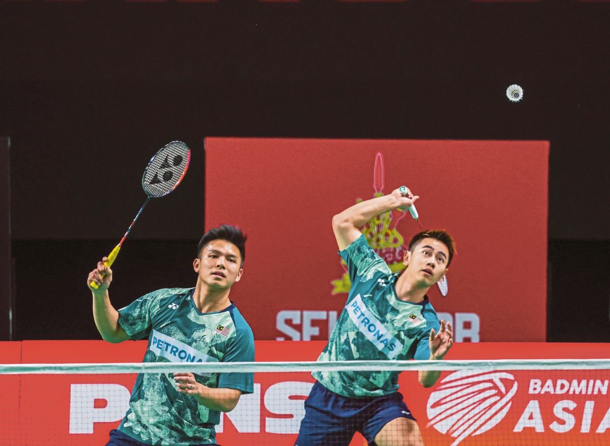 NUR Izzuddin-Sze Fei mara ke final Kejohanan Badminton Asia (BAC). FOTO ASWADI ALIAS
