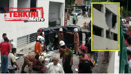 Anggota bomba memeriksa kereta mangsa dan dinding di kawasan parkir yang dirempuh mangsa (gambar kecil). FOTO ihsan bomba