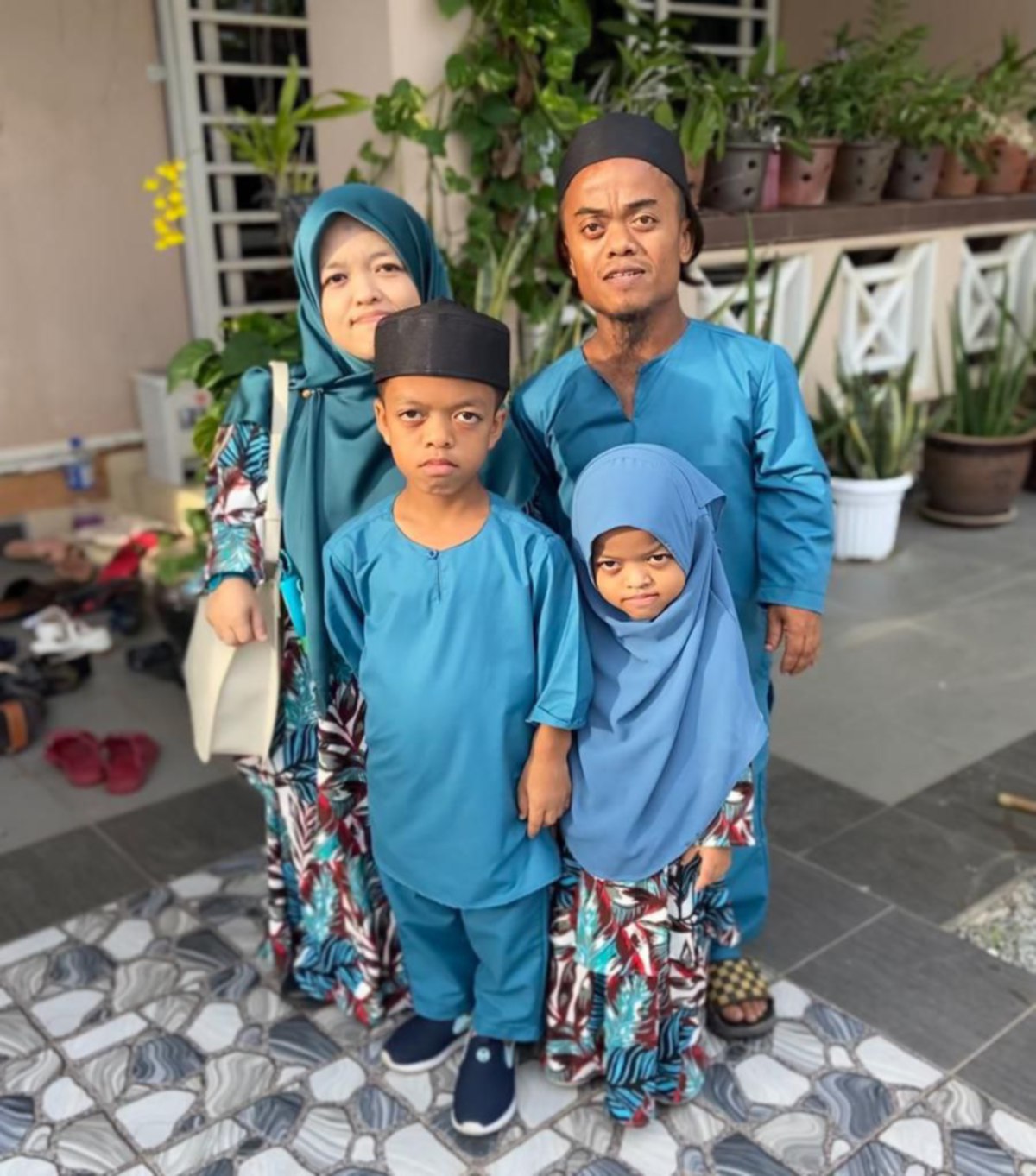 MOHD Afiq bersama isteri dan anak. FOTO Ihsan Mohd Afiq Fikri Firdaus Ibrahim