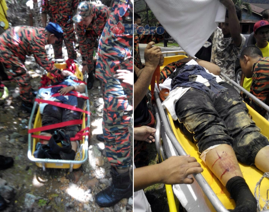 Mangsa diberi rawatan awal di tempat kejadian oleh anggota bomba sebelum dibawa turun ke kaki gunung. - Foto Ihsan Bomba