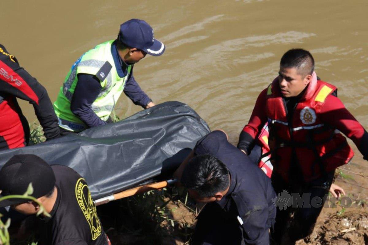 Mayat mangsa ditemui ditebing sungai di Kampung Pagansakan Inobong, pada jam 2.45 petang tadi. Foto Juwan Riduan
