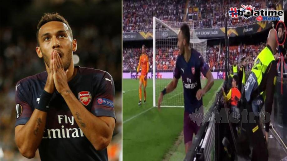 Penyokong Valencia meludah ketika Aubameyang meraikan gol. FOTO REUTERS