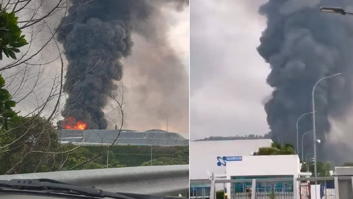KEPULAN asap hitam kelihatan susulan tempat simpanan logistik sisa bahan kimia berjadual di Bukit Pelanduk, Port Dickson, terbakar. FOTO Ihsan pembaca.