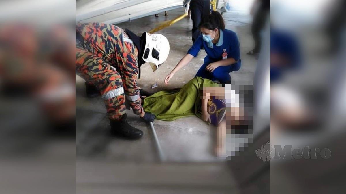 MANGSA ditemukan terbaring di parkir bertingkat sebuah pangsapuri di Sungai Ara. FOTO ihsan bomba