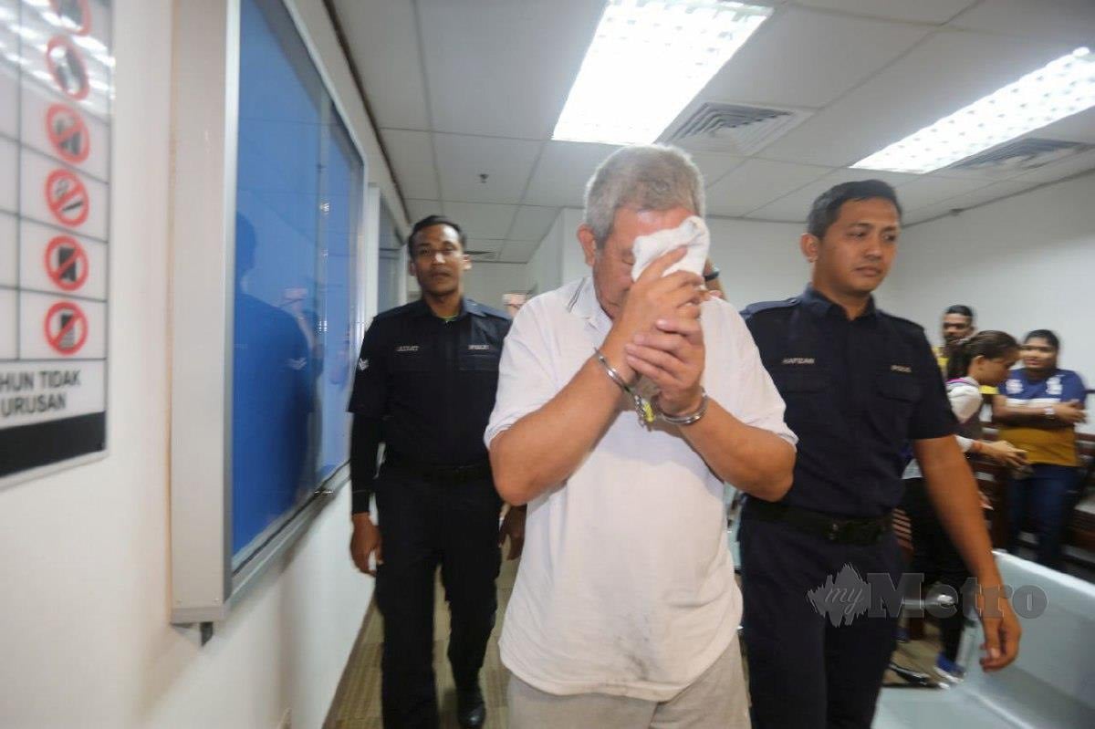 TERTUDUH didakwa di Mahkamah Majistret, hari ini atas pertuduhan membunuh isterinya. FOTO L Manimaran