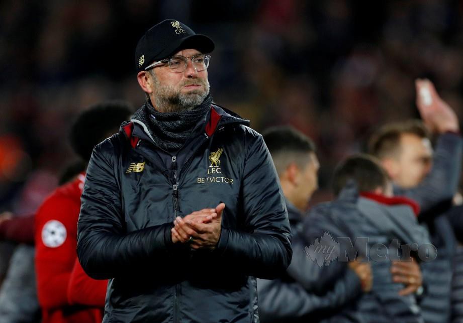 PENGURUS Liverpool, Juergen Klopp bertindak cemerlang dalam Liga Juara-Juara dan Liga Perdana musim ini. — FOTO Reuters