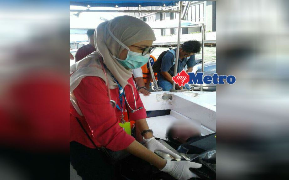Mayat dibawa ke Jeti PPM Kota Kinabalu sebelum ke HQE 1. FOTO ihsan polis 