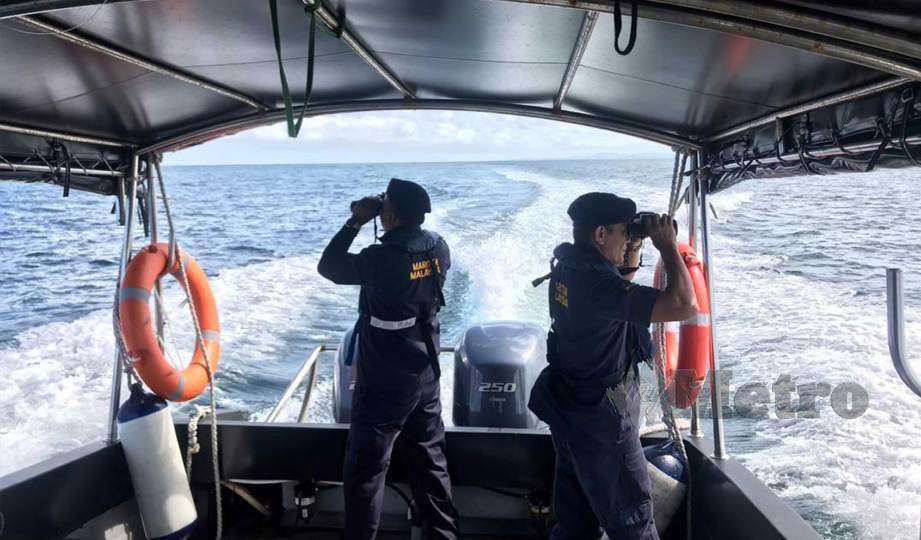 PASUKAN penyelamat menjalankan operasi SAR di sekitar laut di perairan Kudat. FOTO Juwan Riduan