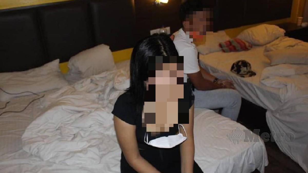 Suspek yang ditahan dalam Op Noda di sebuah hotel di Jalan Tun Sri Lanang, Melaka semalam. Foto Ihsan PDRM
