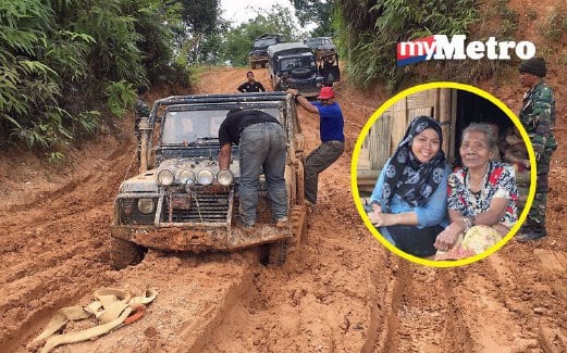KENDERAAN anggota pasukan penyelamat tersangkut di kawasan lumpur dalam perjalanan ke Pos Gawin. Gambar kecil, wartawan Harian Metro bersama Amid  di Pos Gawin. 