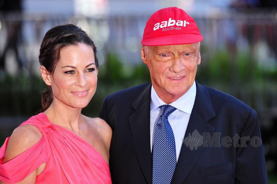 LAUDA bersama isteri Birgit ketika menghadiri satu majlis di London pada 2013. — FOTO AFP