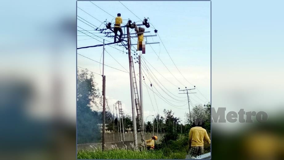 Dua mangsa tersangkut di tiang pencawang dipercayai terkena renjatan elektrik ketika melakukan kerja penyelenggaraan kabel. FOTO Junaidi Ladjana