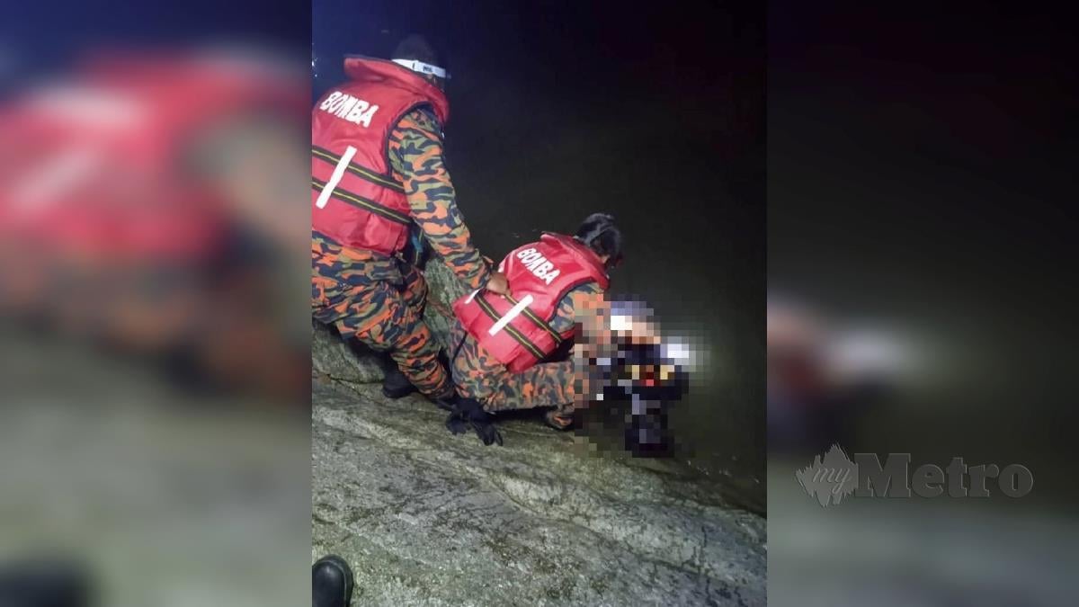 ANGGOTA bomba bawa keluar mayat lelaki b yang ditemukan lemas di Sungai Balak, Batang Kali. FOTO AMIRUL AIMAN HAMSUDDIN