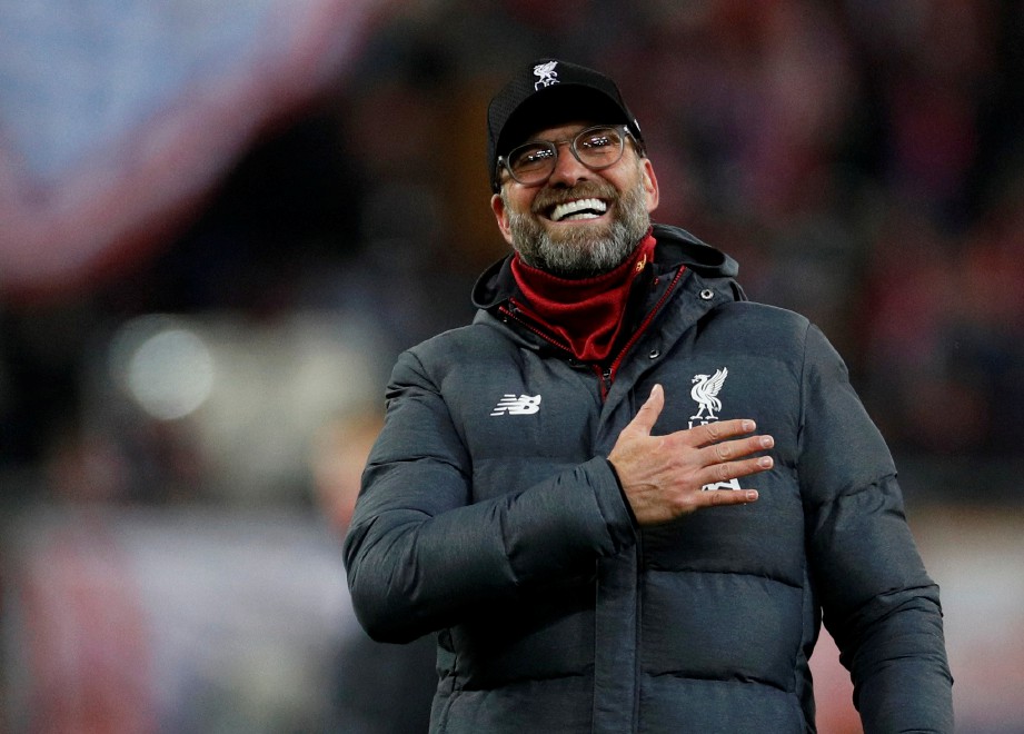 PENGURUS Liverpool  manager Juergen Klopp meraikan kejayaan anak buahnya. FOTO/REUTERS  