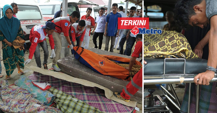 Pasukan perubatan menyusun mayat mangsa gempa di hopsital di Pidie Jaya dan gambar kanan, seorang penduduk meratapi kematian anggota keluarganya. - Foto AFP
