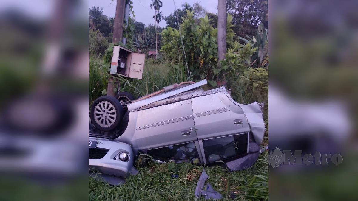 KEADAAN kenderaan mangsa yang terbabit kemalangan maut di Kilometer (KM) 82 Jalan Ipoh-Kuala Lumpur, lewat petang tadi. FOTO Ihsan PDRM.